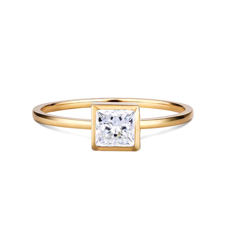 Princess - cut bezel - set diamond ring.