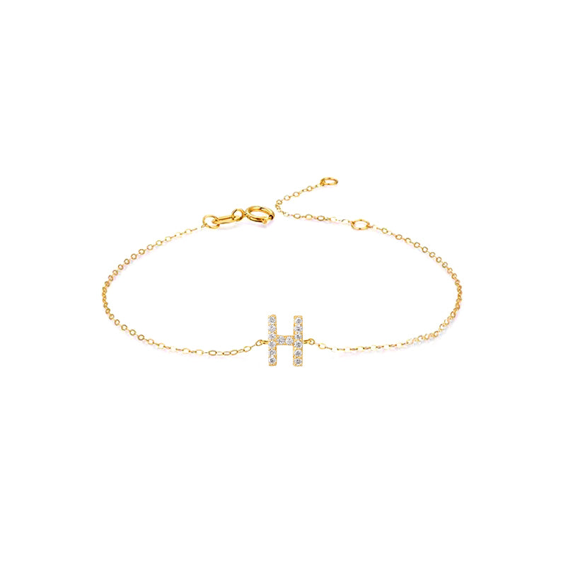 Bracelet with the letter H.