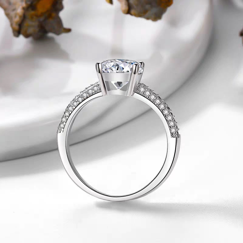 Radiant cut diamond ring.