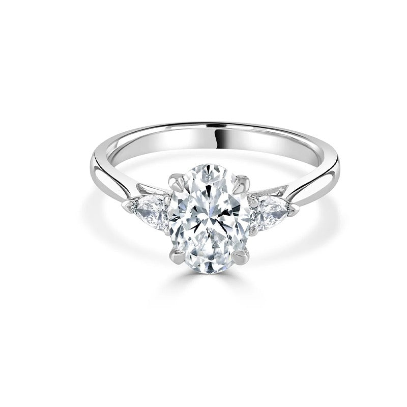 Oval three - stone diamond ring.