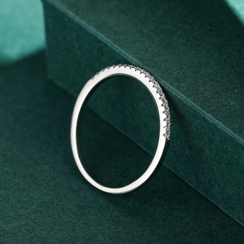 Half - circle pavé ring.